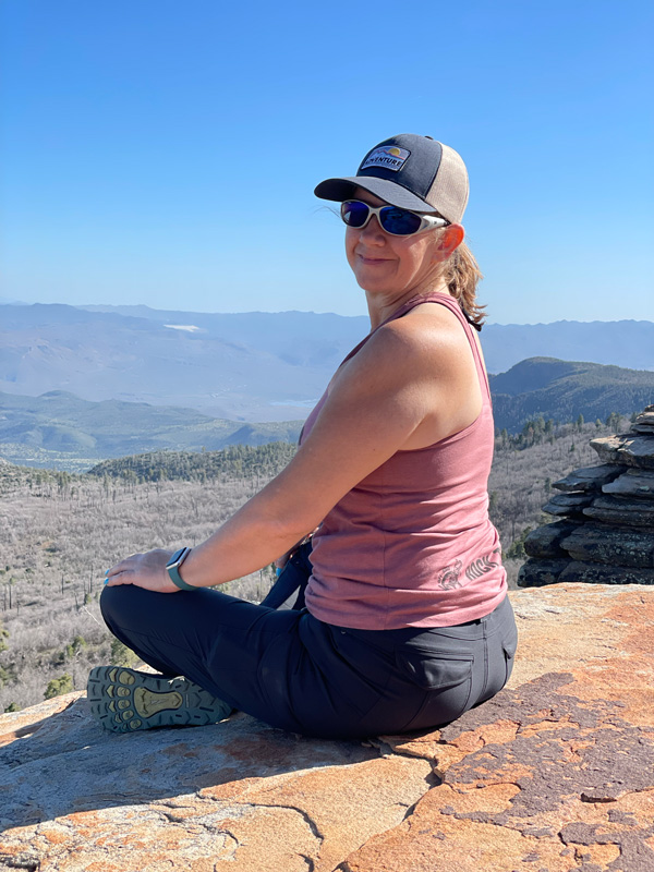 a woman sitting on a vista